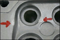 After: automotive aluminum engine block casting defect filled by overlay