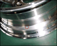 After: casting aluminum wheel minor defect filled by overlay repair
