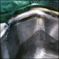 After: press squeezing die repaired by overlay and tungsten carbide coating
