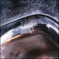 Before: press squeezing die with worn and scuffed chrome plating